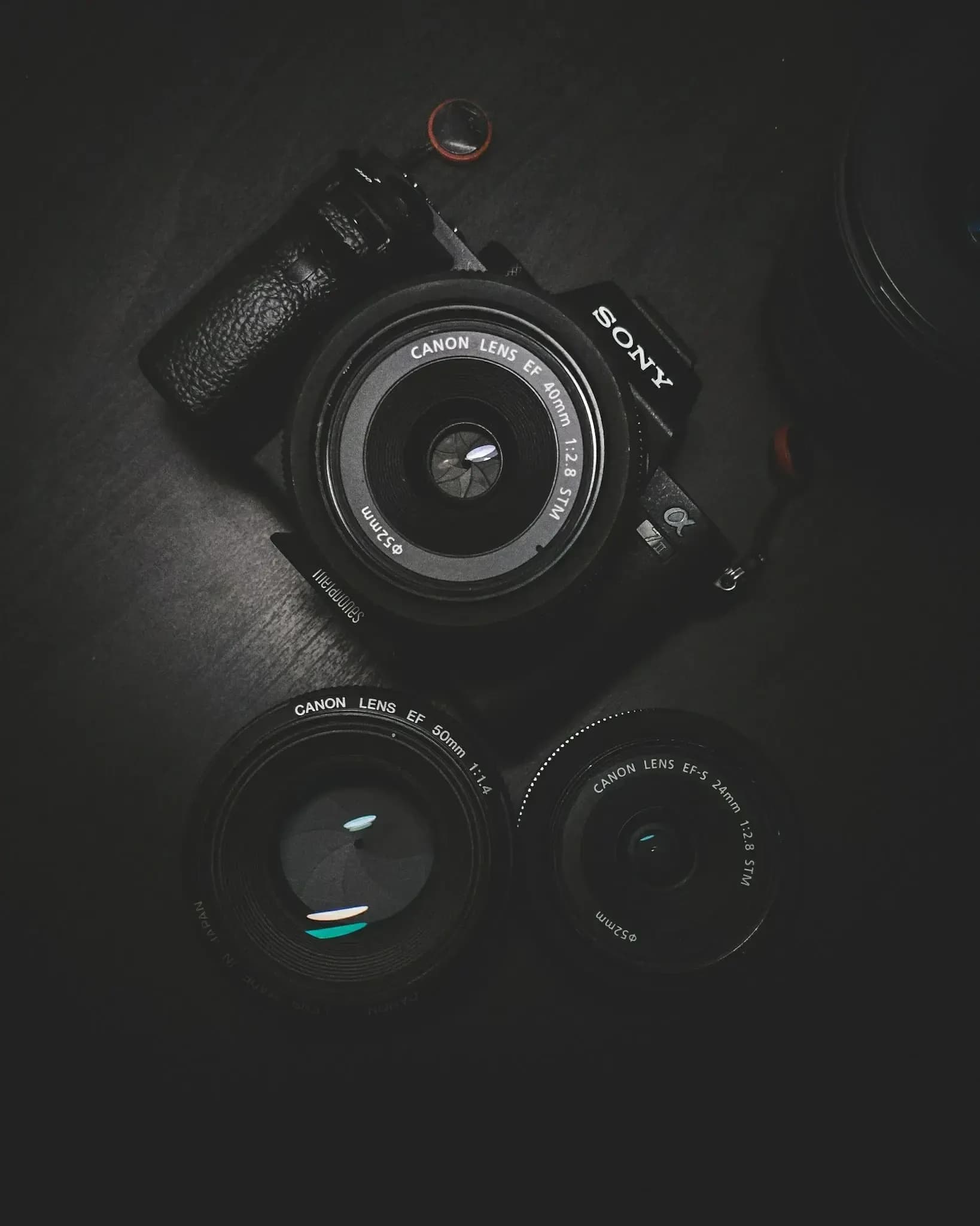 Stock photographer workspace with camera gear and laptop preparing JPEG photos with AI-generated IPTC keywords for Shutterstock, Getty Images and Adobe Stock submissions - Exif Injector EXIF tools, image metadata and SEO keywords