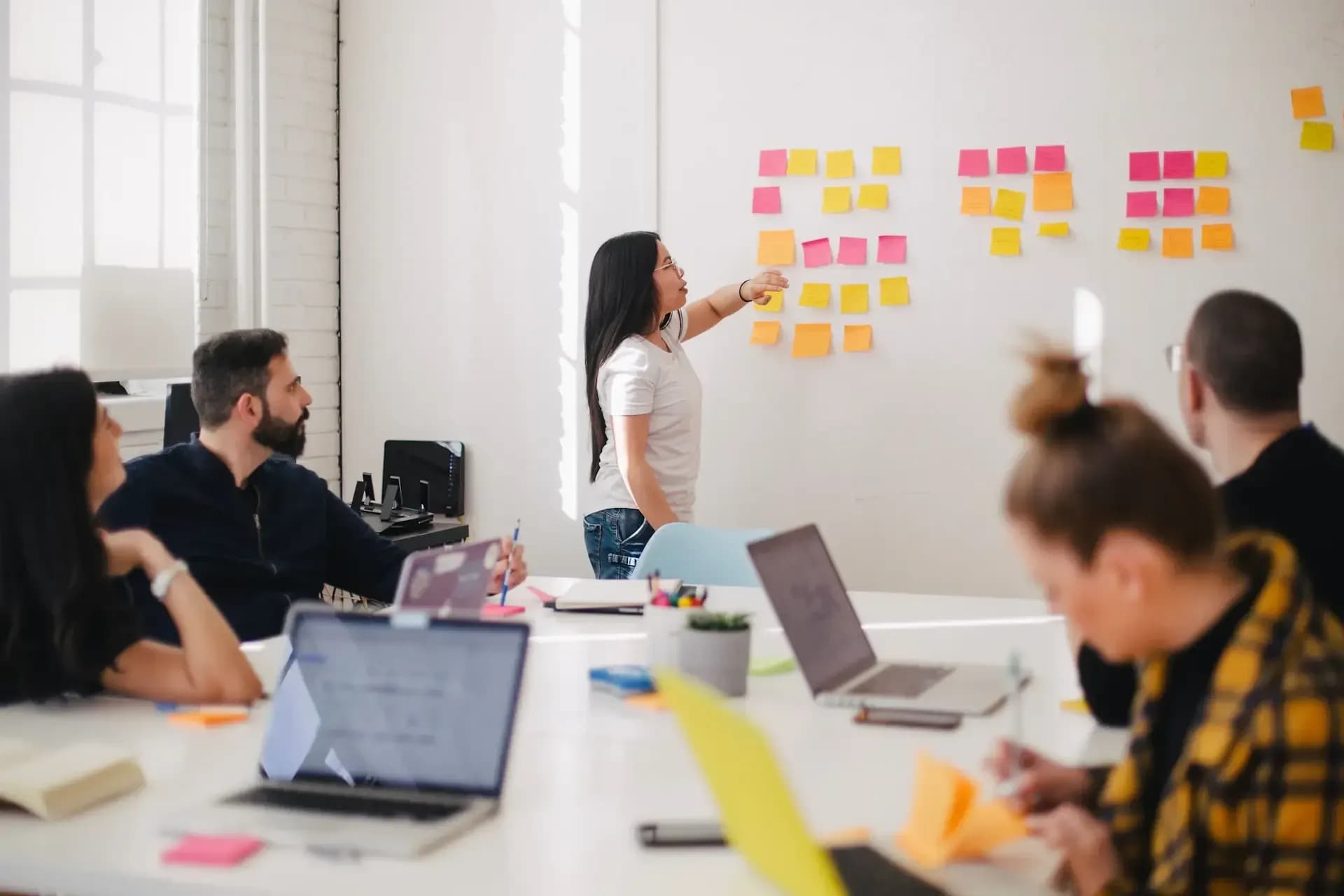 Creative agency team reviewing image catalog with consistent brand metadata, IPTC keywords, copyright and content rating embedded in bulk via Exif Injector for client deliverables - Exif Injector EXIF tools, image metadata and SEO keywords