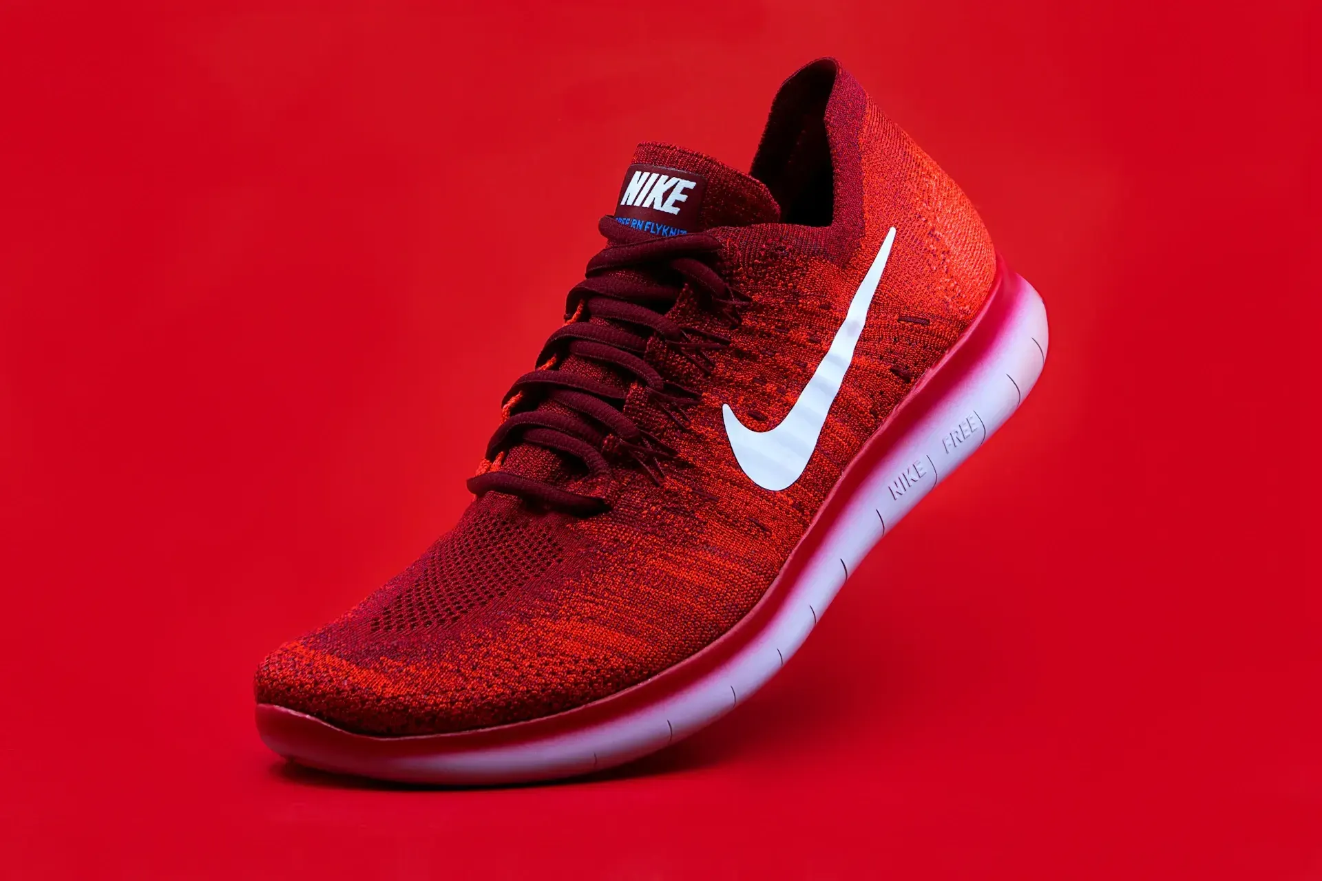Red Nike sneaker product photo